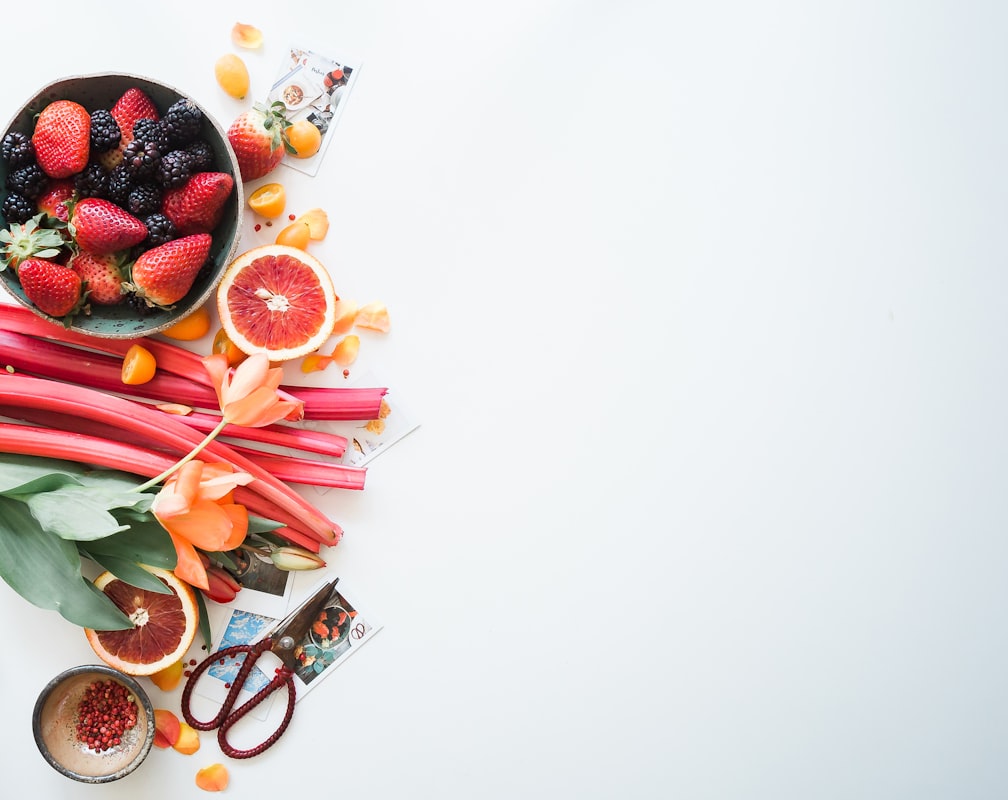 Colorful salad with mixed greens, berries, nuts, and light vinaigrette
